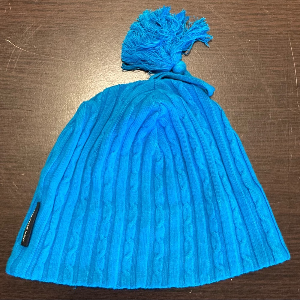 Knit blue obermeyer hat beanie with tassel